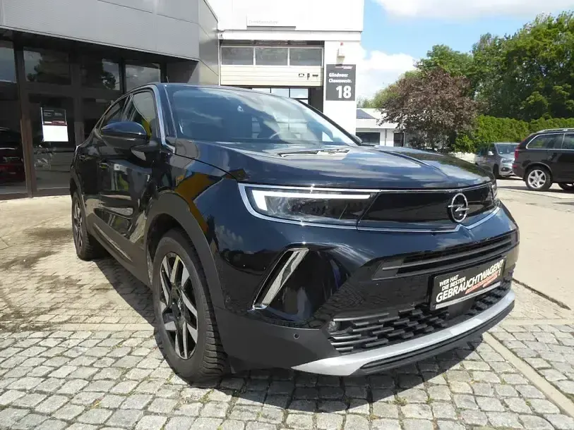 Gebraucht Opel Mokka-e Elegance 100 kW (136 PS) 2023 Karbon schwarz metallic SUV