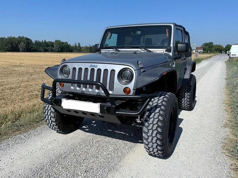 Grau Gebraucht 2013 Jeep Wrangler SUV | 23.999 € (Superpreis) - Bild 1/4
