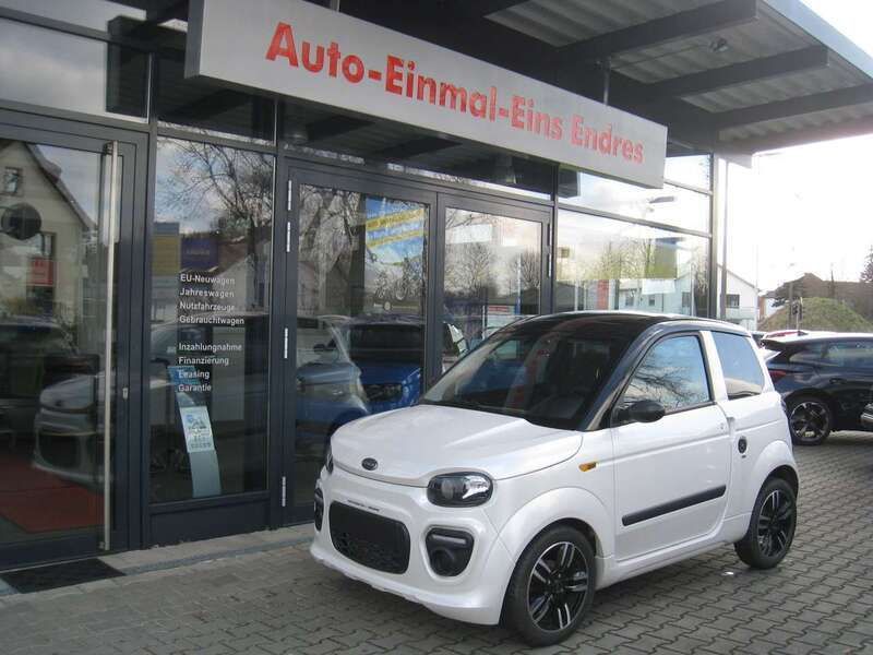 Perlweissmetallic/dach schwarz Gebraucht 2022 Microcar M.Go Kleinwagen | 10.990 € (Fairer Preis) - Bild 1/4