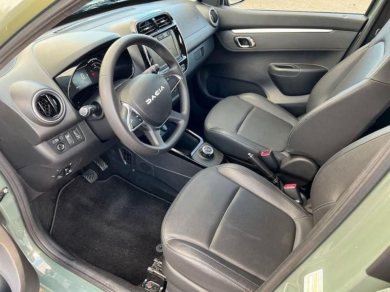 Gebraucht Dacia Spring Extreme 47 kW (65 PS) 2023 Grün Kleinwagen