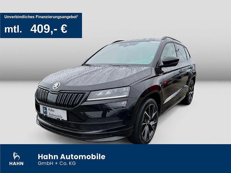 Schwarz Gebraucht 2021 Skoda Karoq SportLine SUV | 31.490 € (Fairer Preis) - Bild 1/3