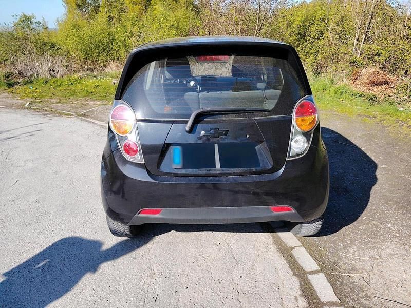 Second-hand Chevrolet Spark 68 CP (50 kW) 2011 Negru Hatchback