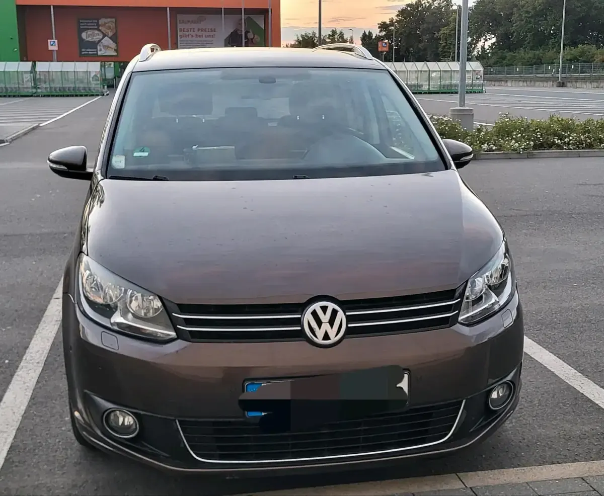 Gebraucht VW Touran Cup 105 PS (77 kW) 2014 Braun Van / Kleinbus