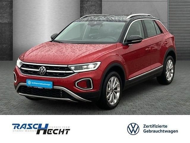 Kings red metallic Gebraucht 2024 VW T-Roc Style SUV | 29.380 € (Fairer Preis) - Bild 1/4