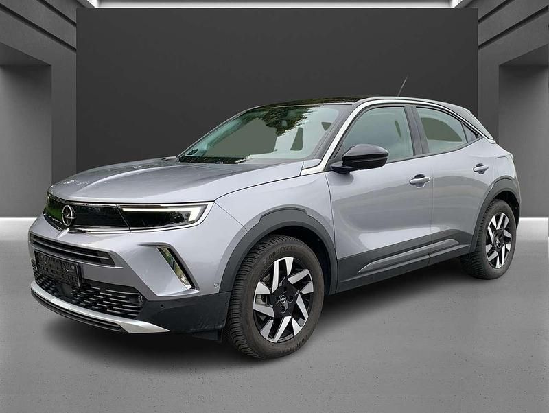 Kontrast grau/quarz silber Gebraucht 2022 Opel Mokka-e Elegance SUV | 13.890 € - Bild 1/4