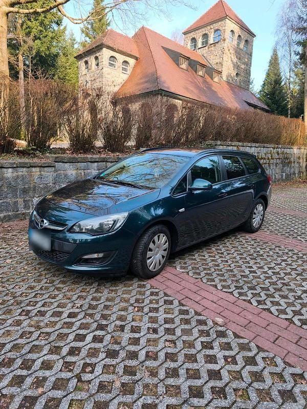 Gebraucht Opel Astra 110 PS (80 kW) 2014 Grün Kombi