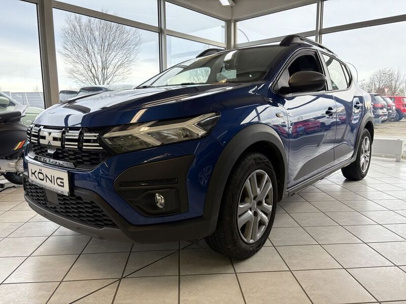 Ironblau metallic Gebraucht 2023 Dacia Sandero Stepway Kleinwagen | 15.980 € (Fairer Preis) - Bild 1/4
