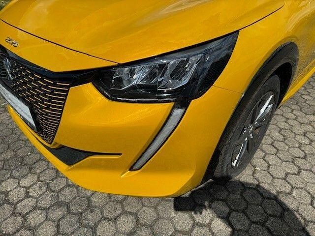 Gebraucht Peugeot e-208 Allure 100 kW (136 PS) 2021 Lack gelb faro/typ aussenverkleidung met (metallic) Kleinwagen