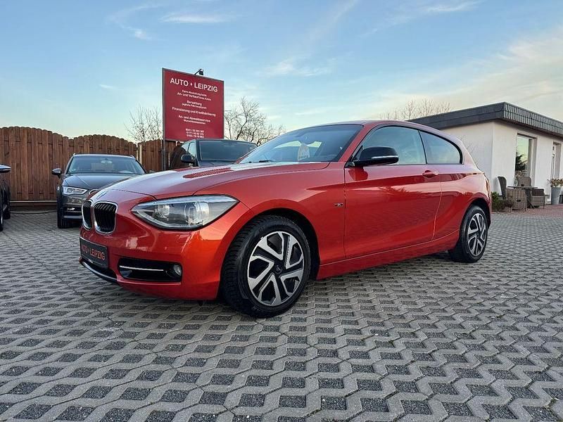 Orange Gebraucht 2015 BMW 116 Sport Line Kleinwagen | 8.990 € (Fairer Preis) - Bild 1/4