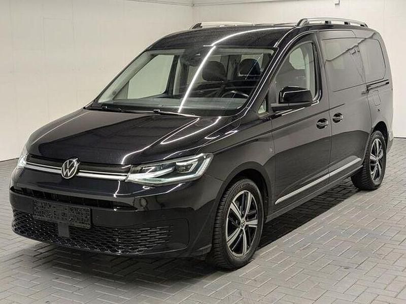 Schwarz (tiefschwarzmet.) Gebraucht 2021 VW Caddy Maxi Style Van / Kleinbus | 29.940 € (Fairer Preis) - Bild 1/4