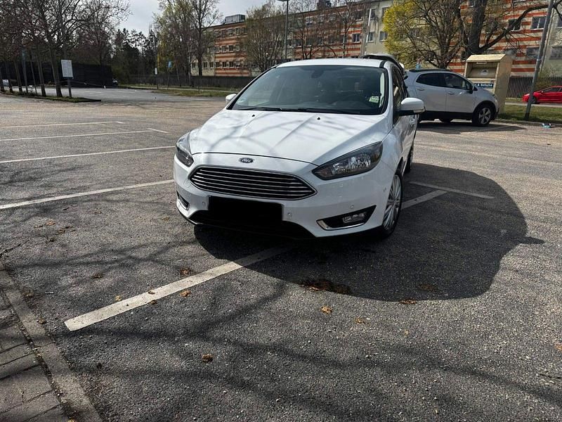 Second-hand Ford Focus Titanium 150 CP (110 kW) 2015 Alb Break