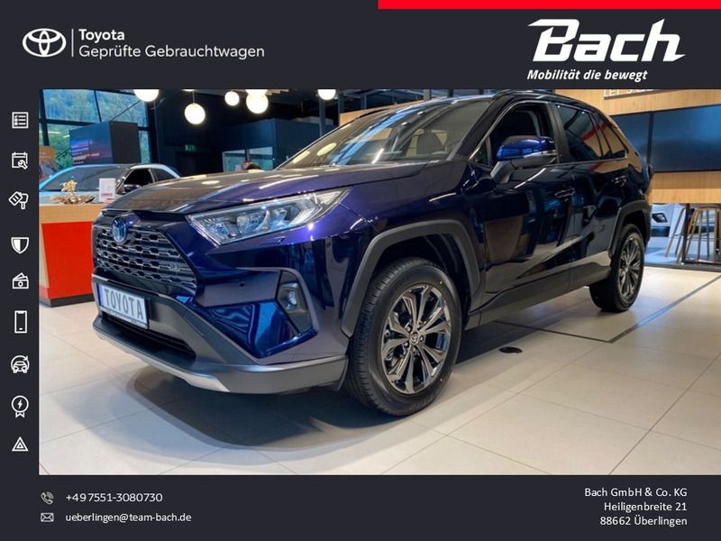 Blau Gebraucht 2024 Toyota RAV4 Hybrid Team SUV | 41.690 € (Fairer Preis) - Bild 1/4