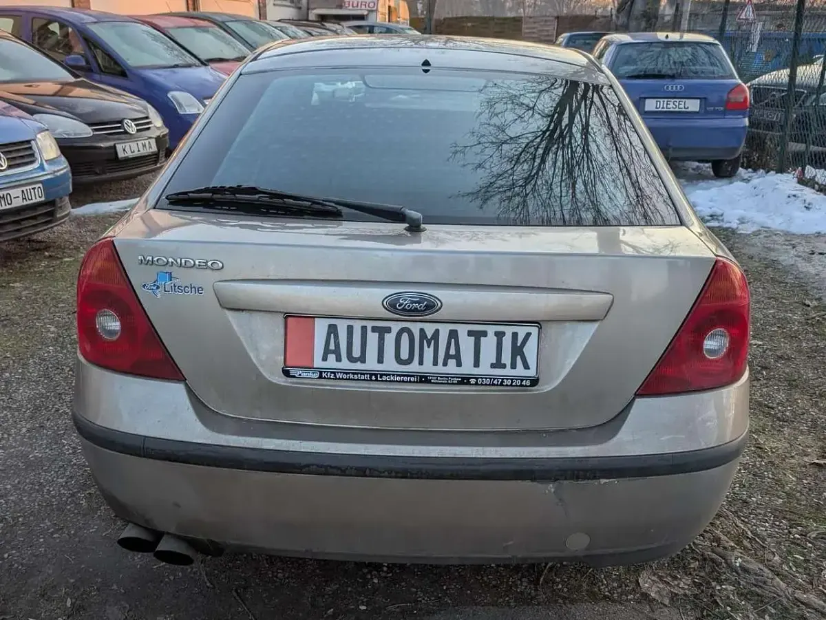 Używany Ford Mondeo Ghia 145 KM (106 kW) 2002 Beżowy Sedan/Limuzyna