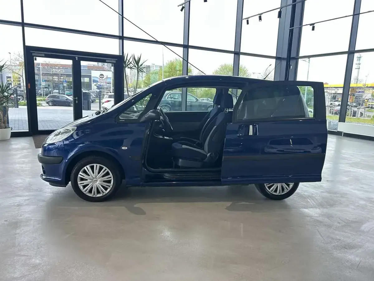 Gebraucht Peugeot 1007 Premium 73 PS (53 kW) 2007 Blau Van / Kleinbus