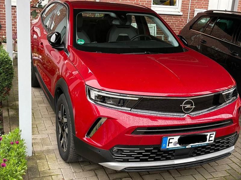 Rot Gebraucht 2021 Opel Mokka-e Elegance SUV | 15.990 € (Superpreis) - Bild 1/4