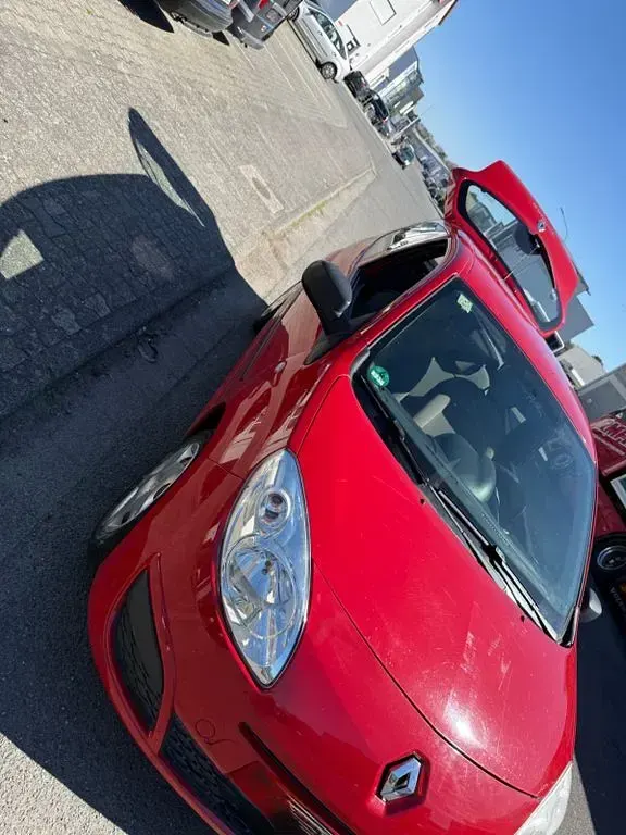 Używany Renault Twingo 58 KM (42 kW) 2011 Czerwony Hatchback