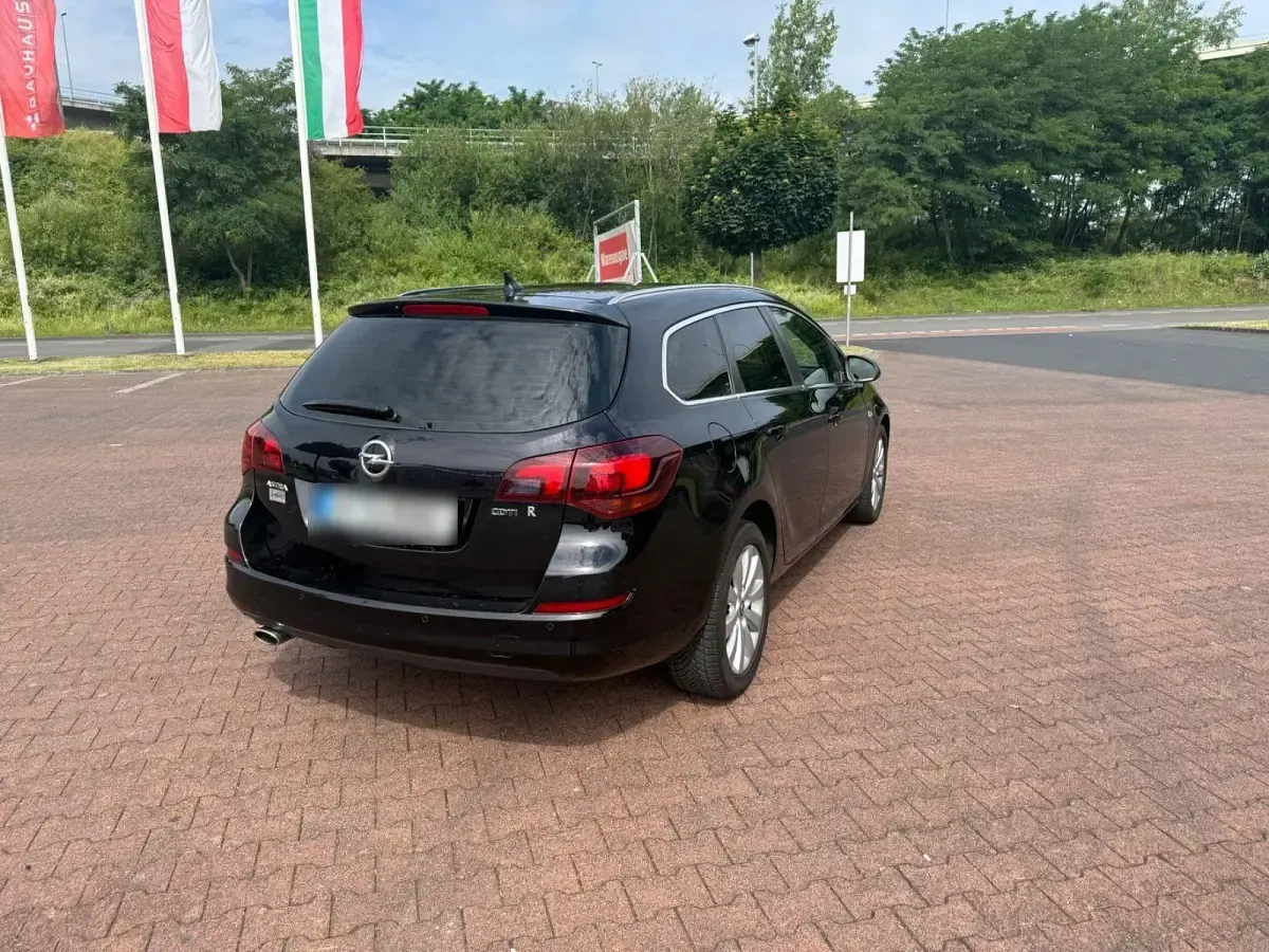 Gebraucht Opel Astra 160 PS (117 kW) 2010 Schwarz Kombi
