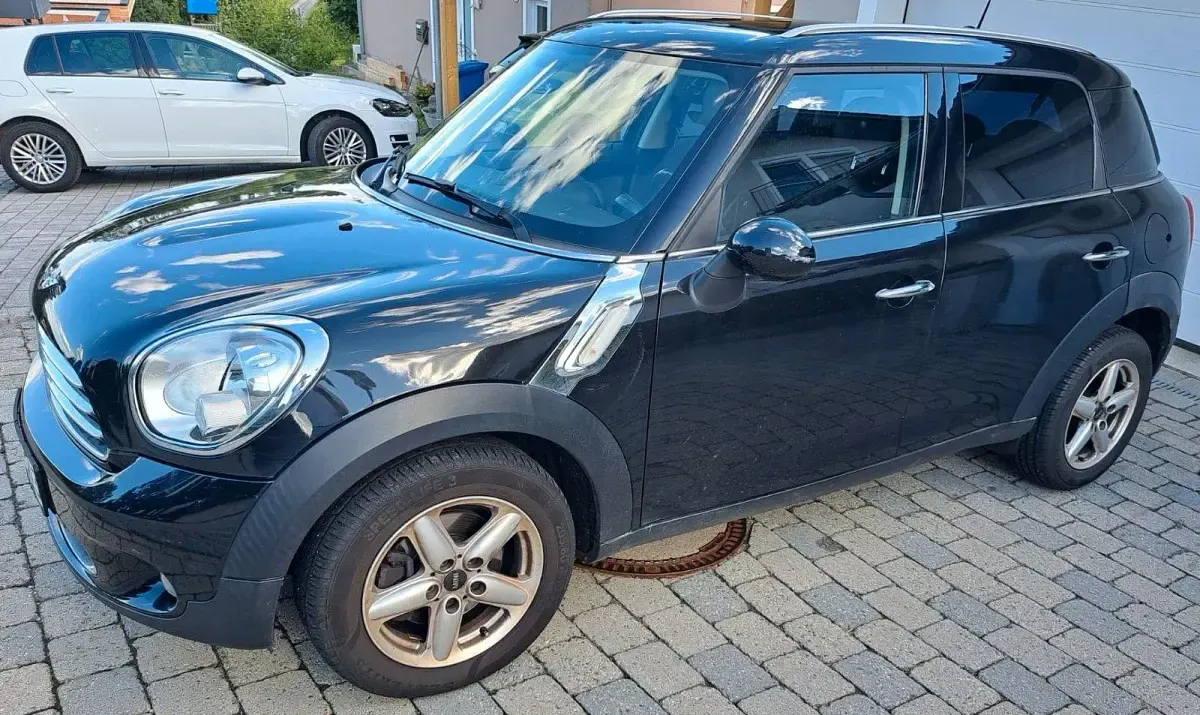 Gebraucht Mini Cooper D 111 PS (81 kW) 2011 Schwarz Kleinwagen