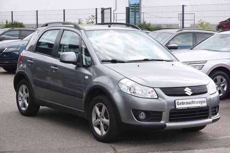 Grau Gebraucht 2006 Suzuki SX4 Limousine | 4.999 € (Fairer Preis) - Bild 1/2