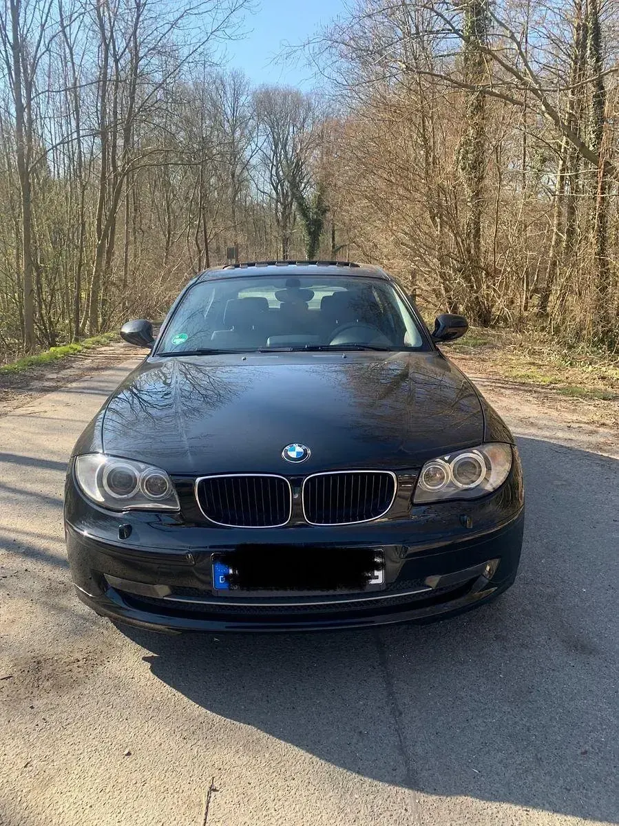 Gebraucht BMW 116 122 PS (89 kW) 2009 Schwarz Kleinwagen