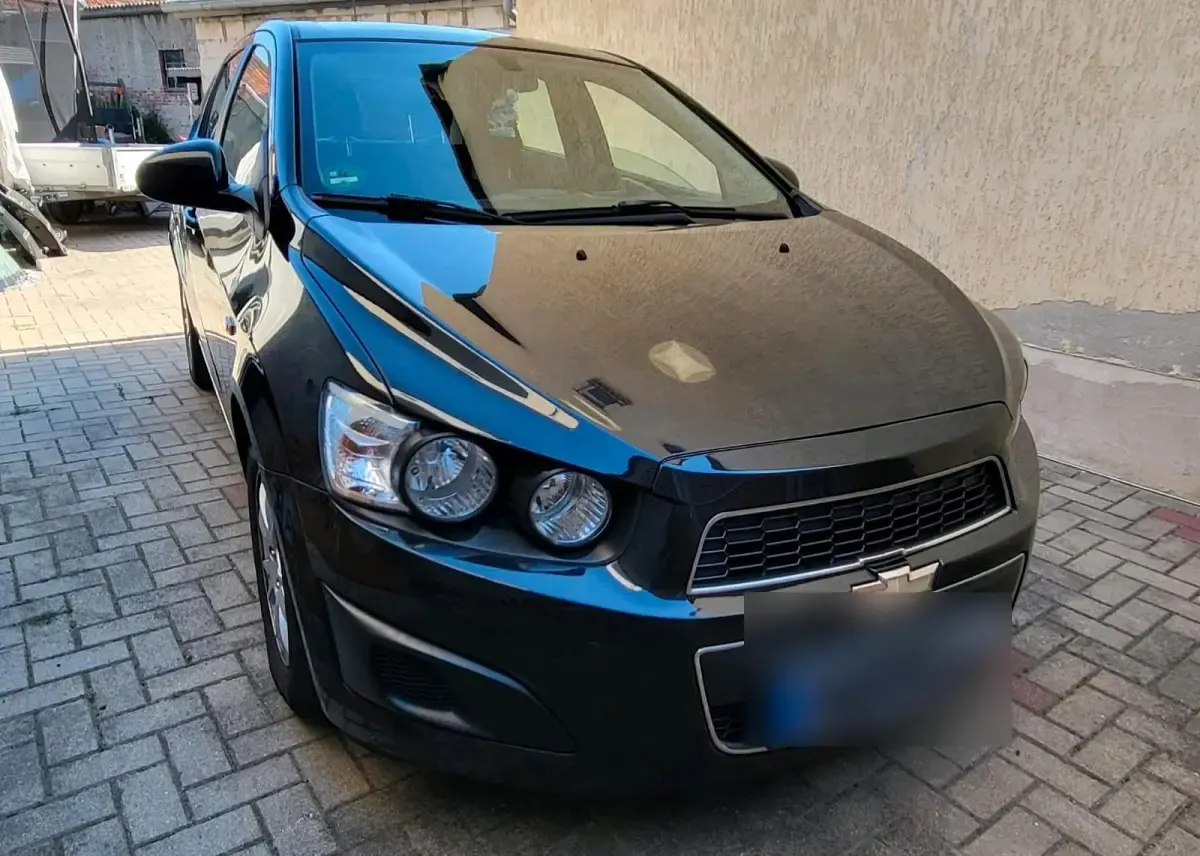 Gebraucht Chevrolet Aveo 101 PS (74 kW) 2012 Schwarz Kleinwagen