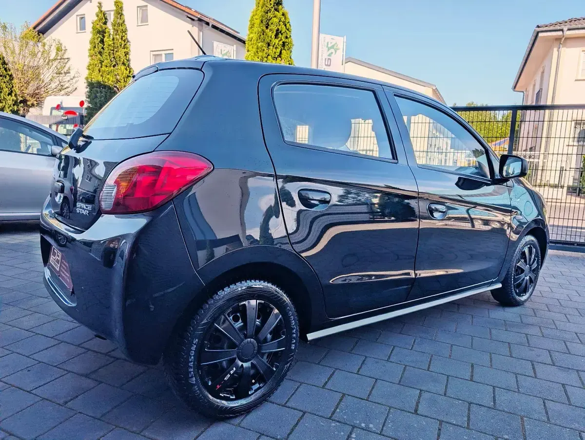 Gebraucht Mitsubishi Space Star 71 PS (52 kW) 2015 Schwarz Limousine