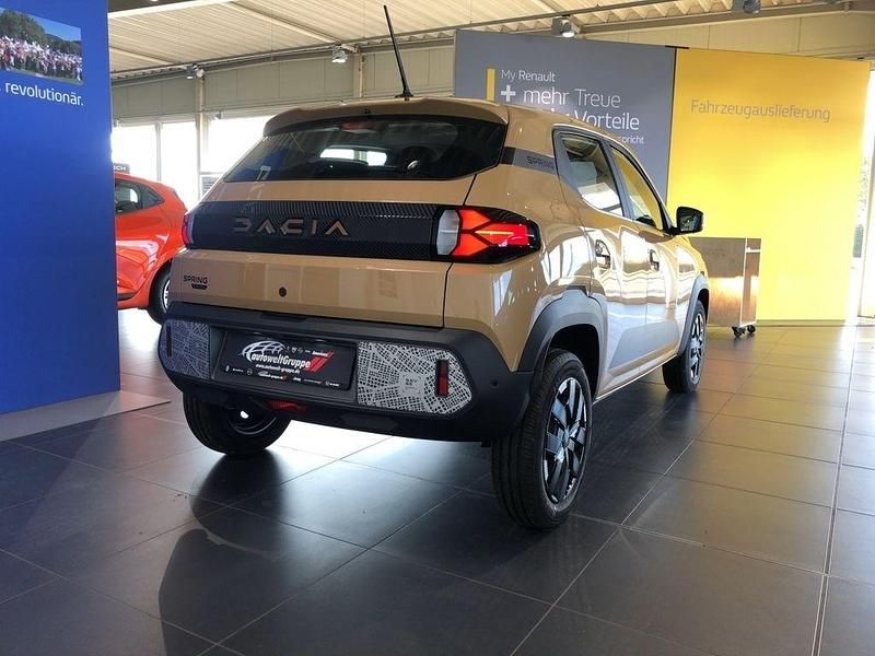 Gebraucht Dacia Spring Extreme 47 kW (65 PS) 2024 Beige Kleinwagen