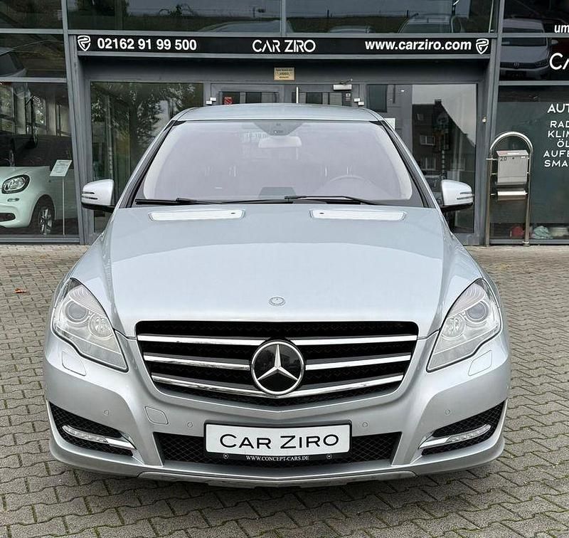 Silber Gebraucht 2011 Mercedes R350 AMG line Van / Kleinbus | 16.600 € (Teuer) - Bild 1/4