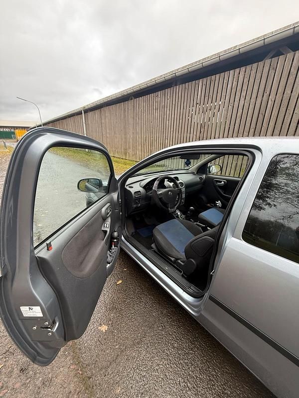 Gebraucht Opel Corsa 80 PS (58 kW) 2004 Grau Kleinwagen