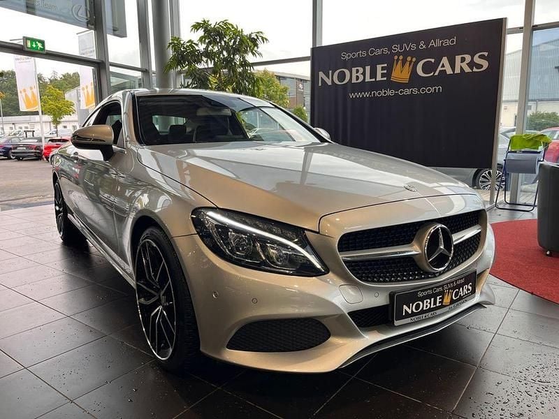 Iridiumsilber Gebraucht 2017 Mercedes C180 Coupé | 19.590 € (Guter Preis) - Bild 1/4