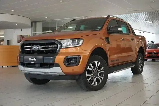Gebraucht Ford Ranger Wildtrack 212 PS (155 kW) 2023 Orange metallic Pickup