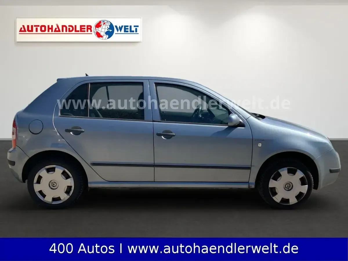 Używany Skoda Fabia 75 KM (55 kW) 2005 Szary Kombi