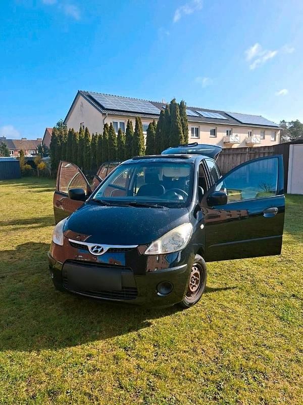 Gebraucht Hyundai i10 69 PS (50 kW) 2011 Schwarz Kleinwagen