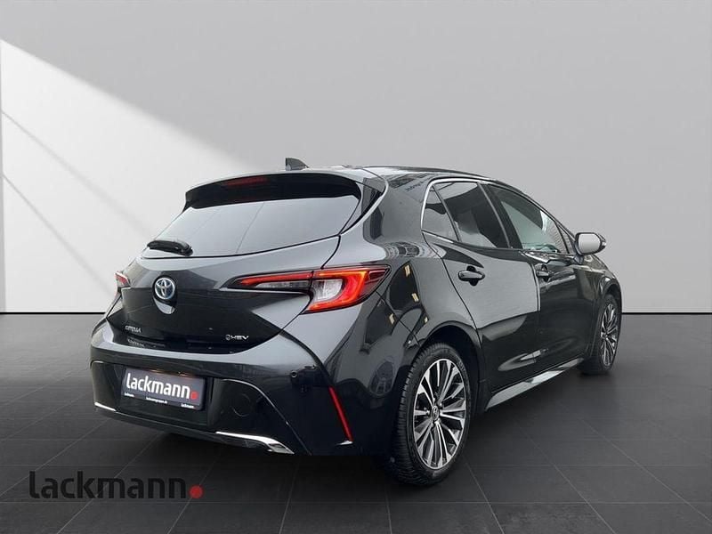 Gebraucht Toyota Corolla Hybrid Team 140 PS (102 kW) 2024 Night time black Limousine