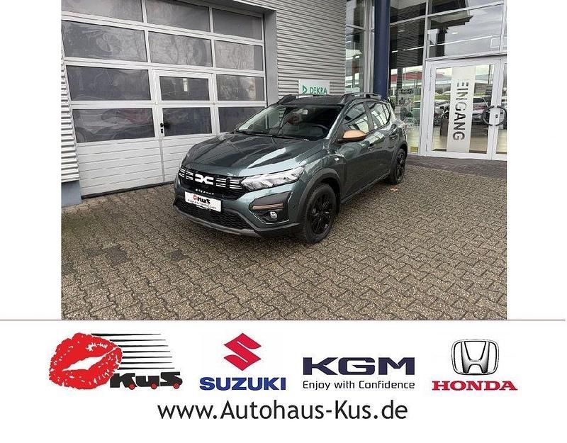 Gebraucht Dacia Sandero 101 PS (74 kW) 2024 Oxidgrün (metallic) Limousine