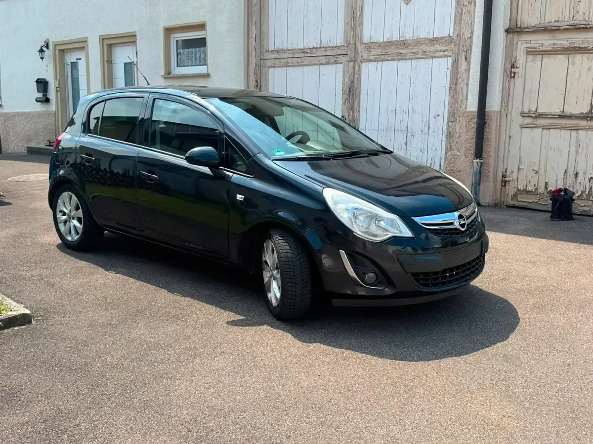 Gebraucht Opel Corsa 85 PS (62 kW) 2012 Schwarz Kleinwagen