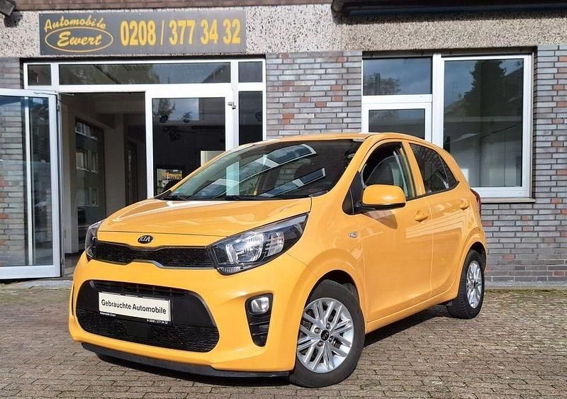Gelb Gebraucht 2021 Kia Picanto DREAM-TEAM Edition Kleinwagen | 11.480 € (Fairer Preis) - Bild 1/4
