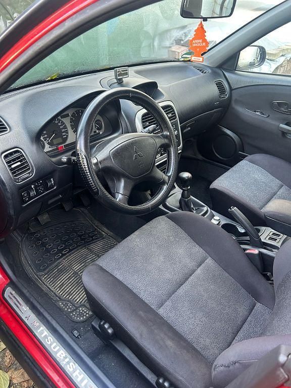 Schwarz Gebraucht 2004 Mitsubishi Carisma Limousine | 1.690 € (Fairer Preis) - Bild 1/4