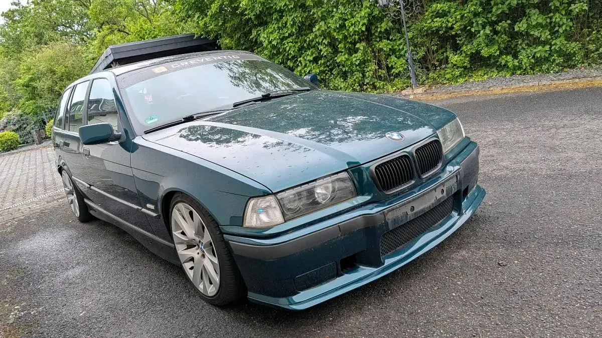 Używany BMW 318 Basis 116 KM (85 kW) 1997 Zielony Kombi
