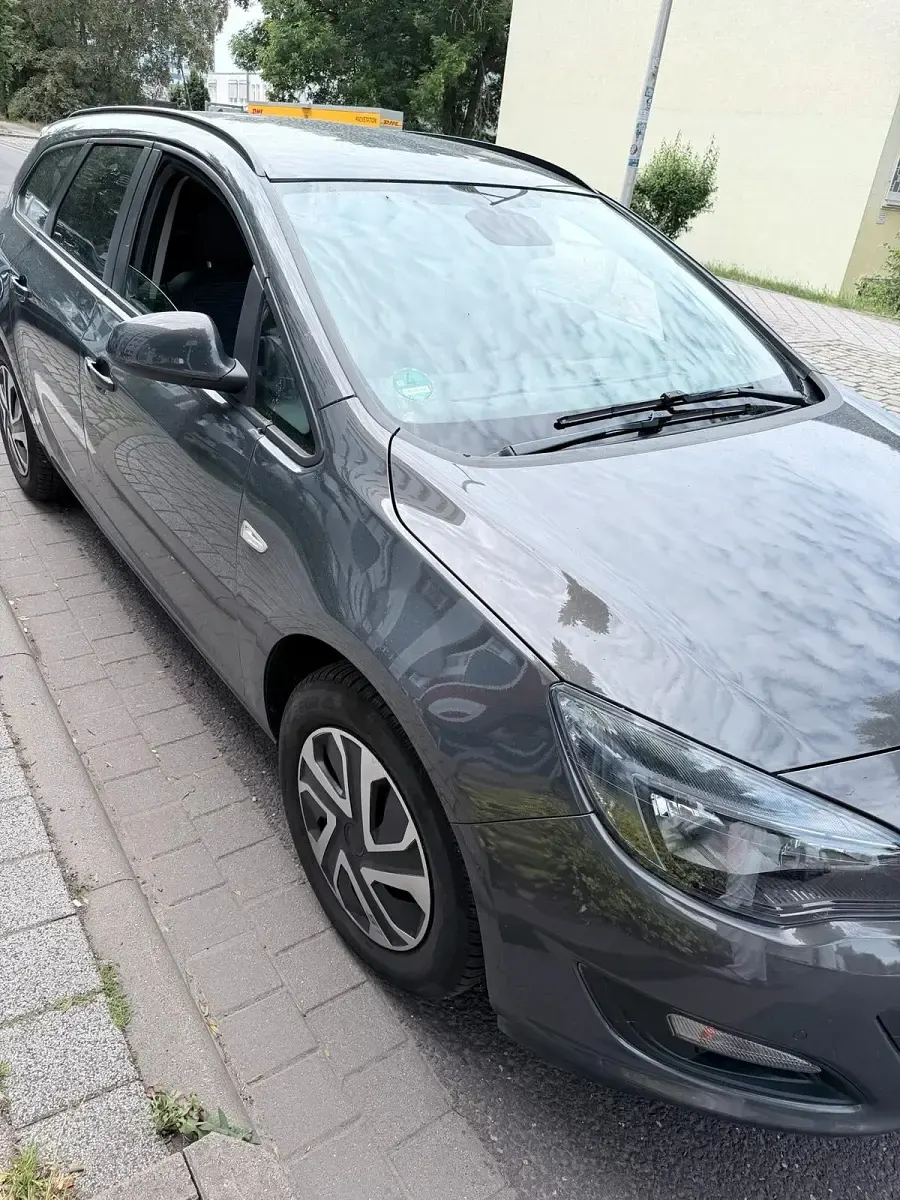 Gebraucht Opel Astra 110 PS (80 kW) 2015 Grau Kombi