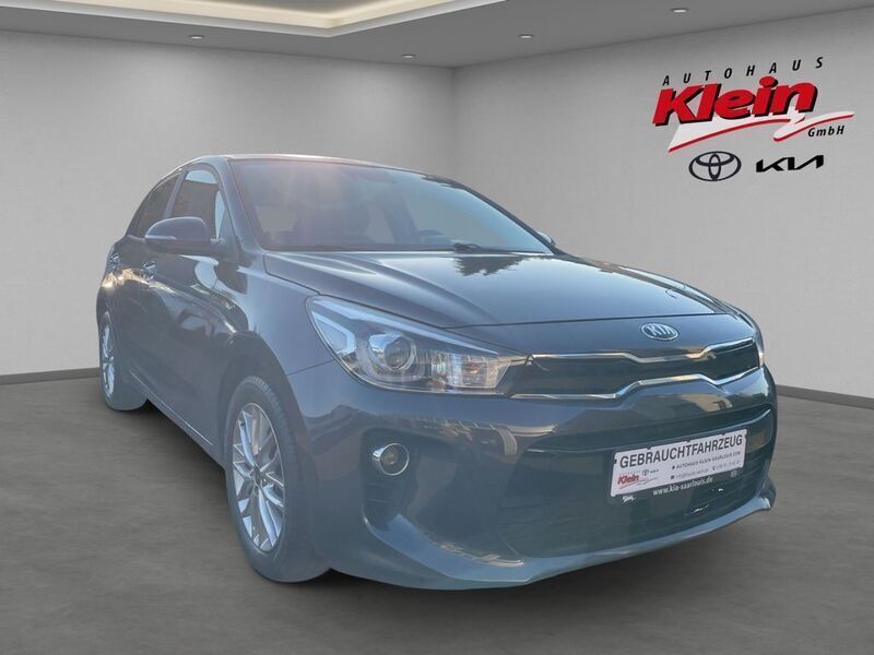 Grau Gebraucht 2020 Kia Rio DREAM-TEAM Edition Limousine | 13.260 € (Fairer Preis) - Bild 1/4