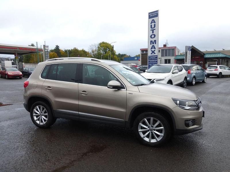 Beige Gebraucht 2015 VW Tiguan LOUNGE SUV | 13.770 € (Fairer Preis) - Bild 1/4