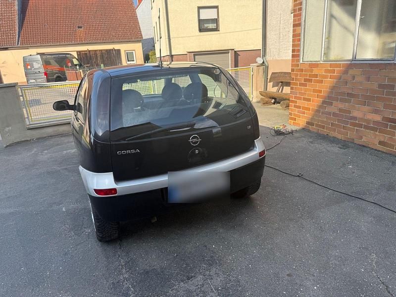 Second-hand Opel Corsa 75 CP (55 kW) 2002 Negru Hatchback