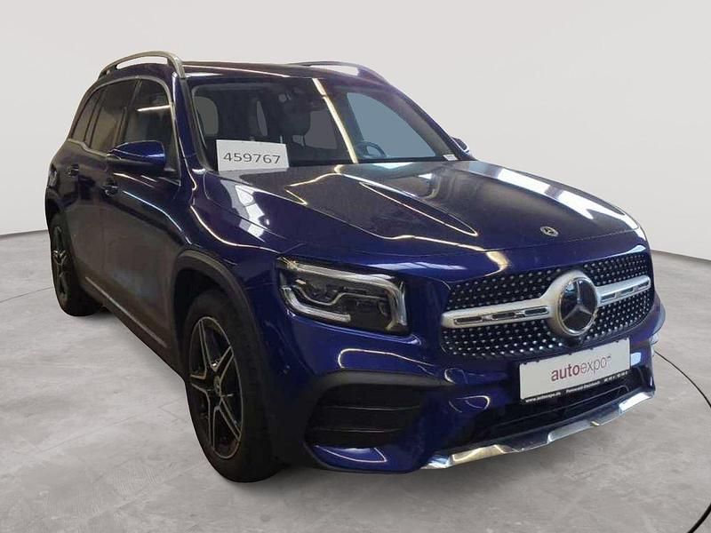Galaxyblau metalic Gebraucht 2021 Mercedes GLB200 AMG line SUV | 27.990 € (Fairer Preis) - Bild 1/4