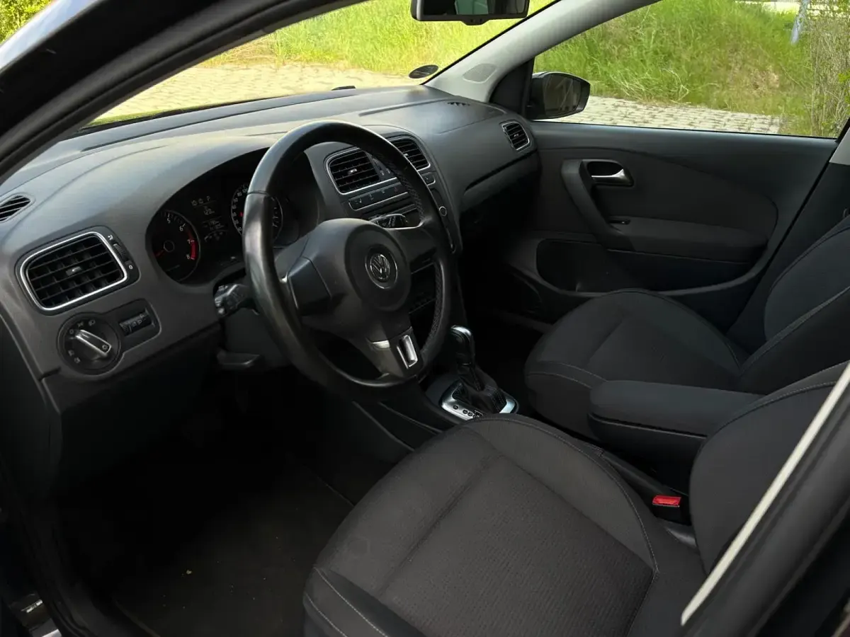 Gebraucht VW Polo Team 85 PS (62 kW) 2010 Schwarz Kleinwagen