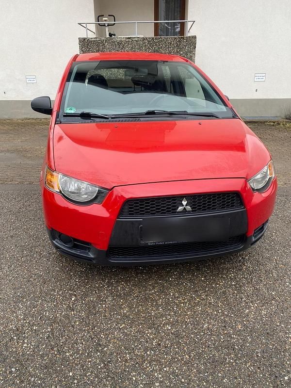 Gebraucht Mitsubishi Colt 95 PS (69 kW) 2009 Rot Kleinwagen