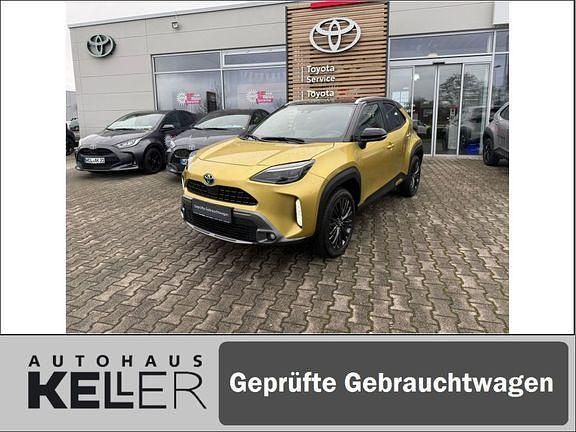 Warm gold metallic, dach schwarz Gebraucht 2022 Toyota Yaris Hybrid Advance | 25.990 € (Teuer) - Bild 1/4