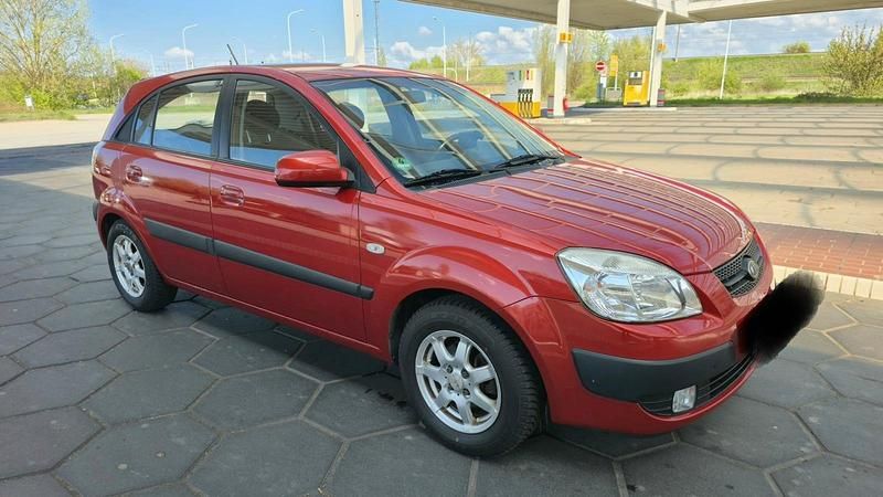 Second-hand Kia Rio 95 CP (69 kW) 2009 Roșu Berlinǎ