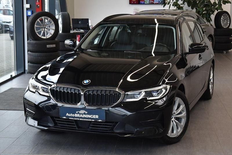 Schwarz Gebraucht 2021 BMW 320 Advantage Kombi | 22.980 € (Fairer Preis) - Bild 1/4