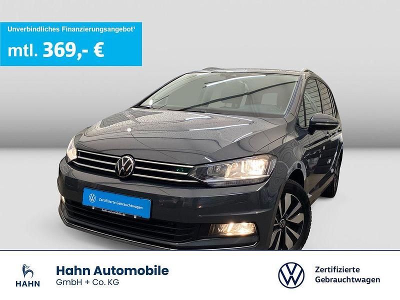 Grau Gebraucht 2024 VW Touran Move Van / Kleinbus | 34.430 € (Fairer Preis) - Bild 1/3